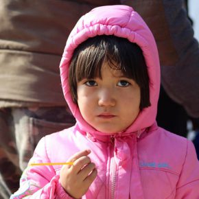 A child in Presevo refugee centre. Serbia, 2015.