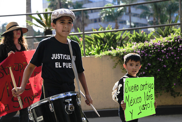 Child migrants also flee political crises, too. Mexican kids protesting against the kidnapping of 43 Iguala students. Los Angeles, September 2014.